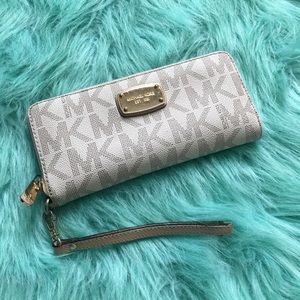 Authentic MK logo wristlet.